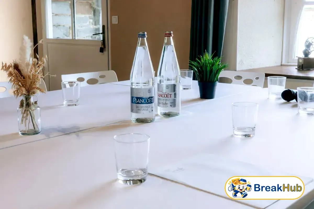Bottled juice on a meeting table (illustration)
