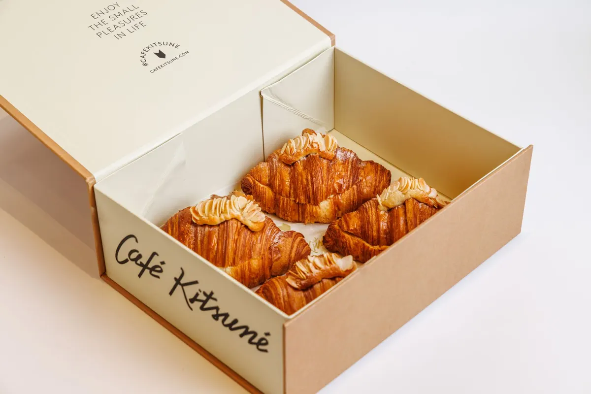 Packed pastry boxes ready for collection (illustration)