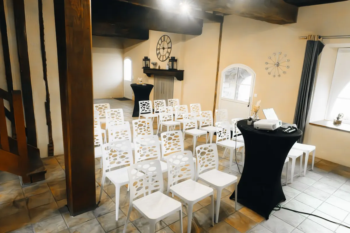 Seminar room with a break area during a meeting (illustration)